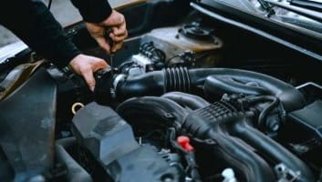 ASE-certified technician performing transmission diagnostics at Allied Auto Services in Roselle